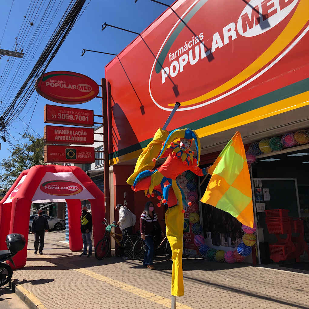 Interior da Farmácia em Canoas – Popularmed Niterói, corredores amplos e organização impecável.